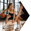Two people playing basketball in a gym setting